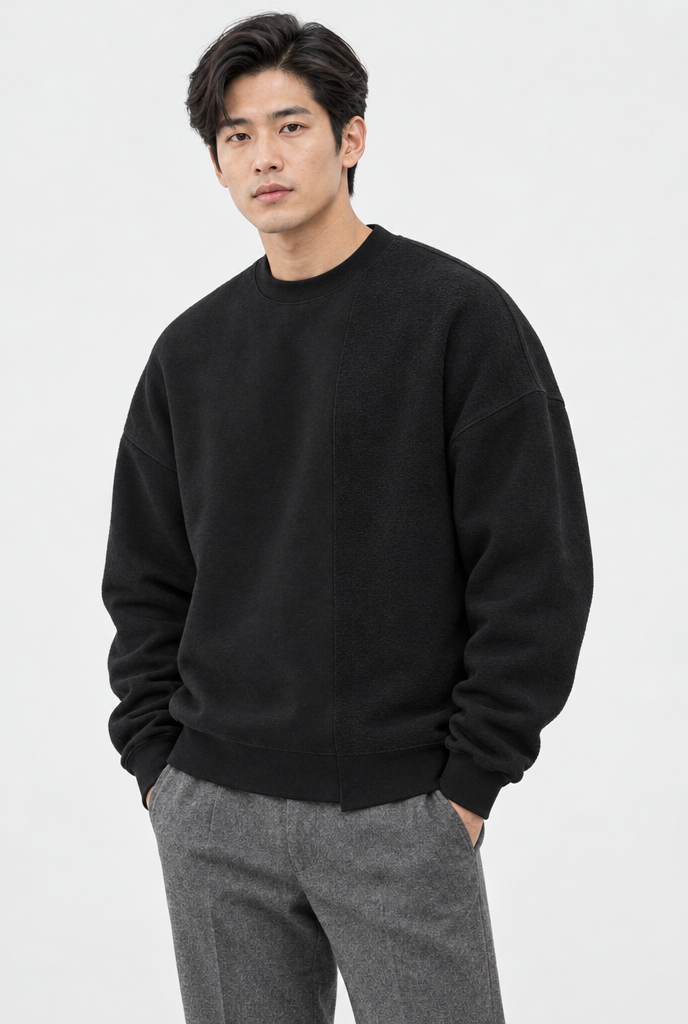 Sweat col rond oversize épaules tombantes — Noir — photo studio