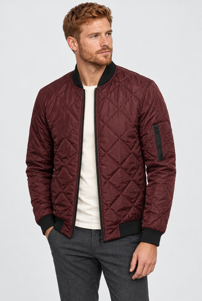 Burgundy diamond-quilted bomber jacket, studio hero