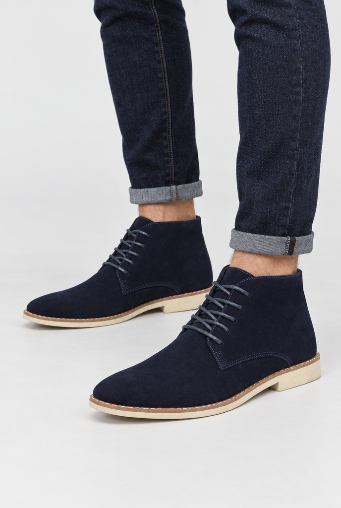 Navy suede-look chukka boots, on feet