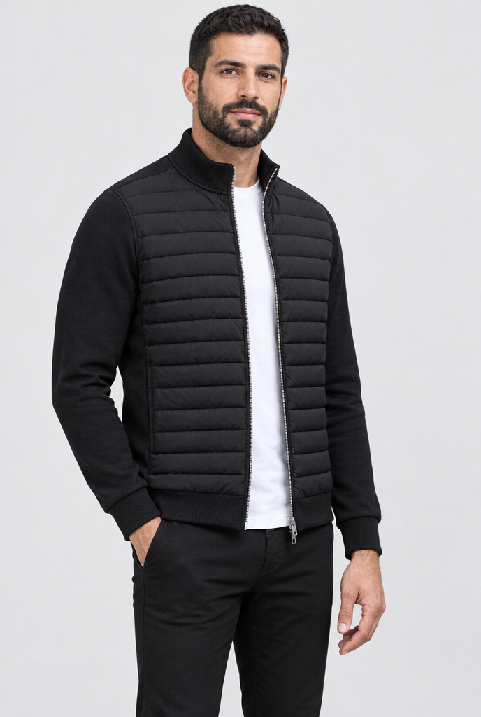 Black quilted-front knit-sleeve jacket, studio hero